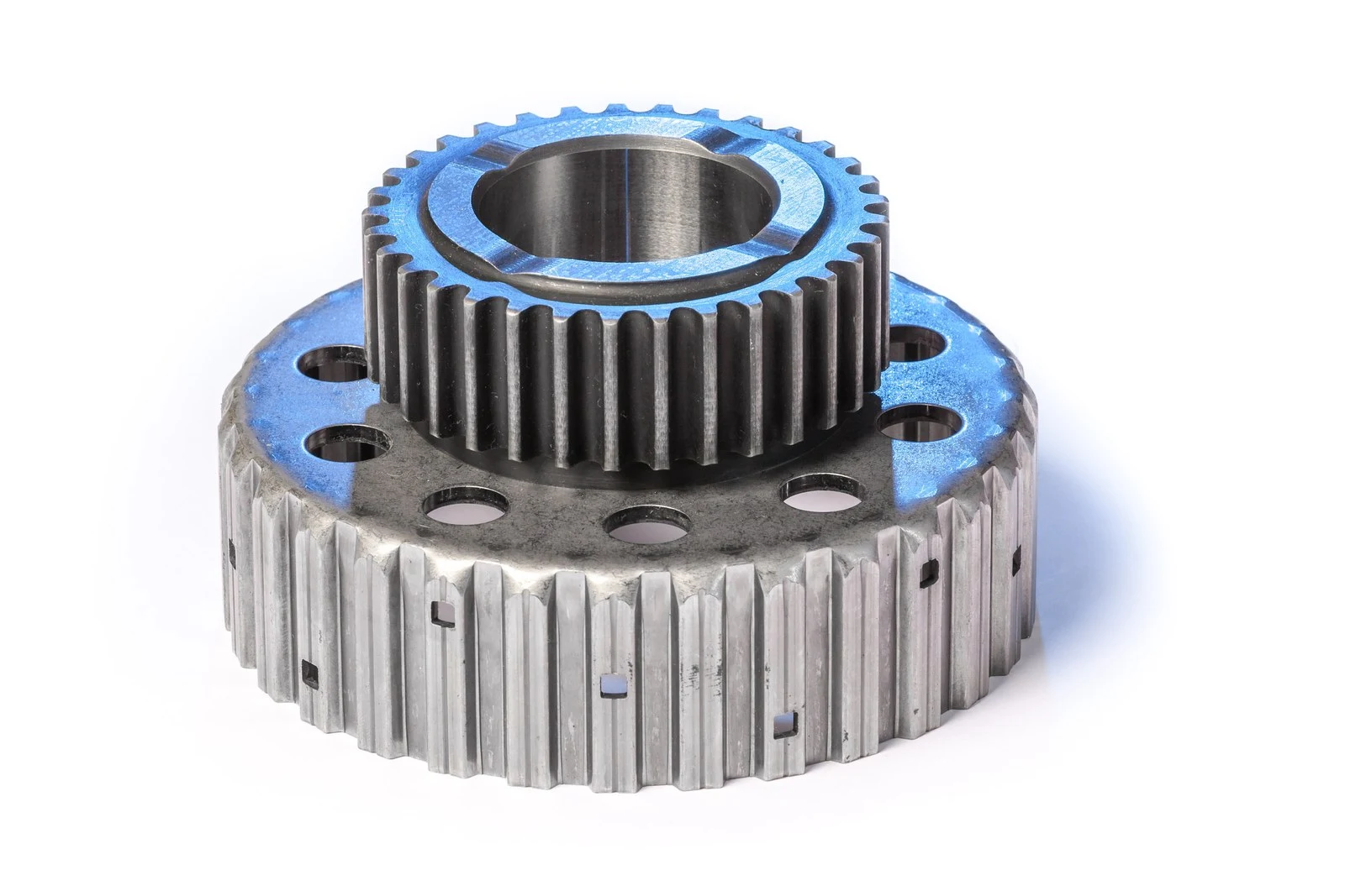 Machined gear welded to a formed sheet metal drum.